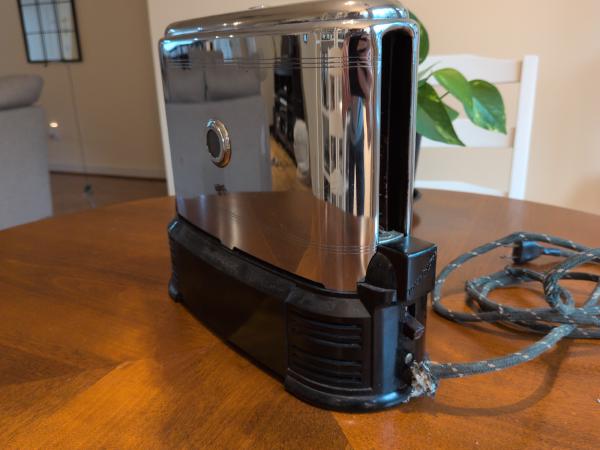 Other side of toaster, with cord.